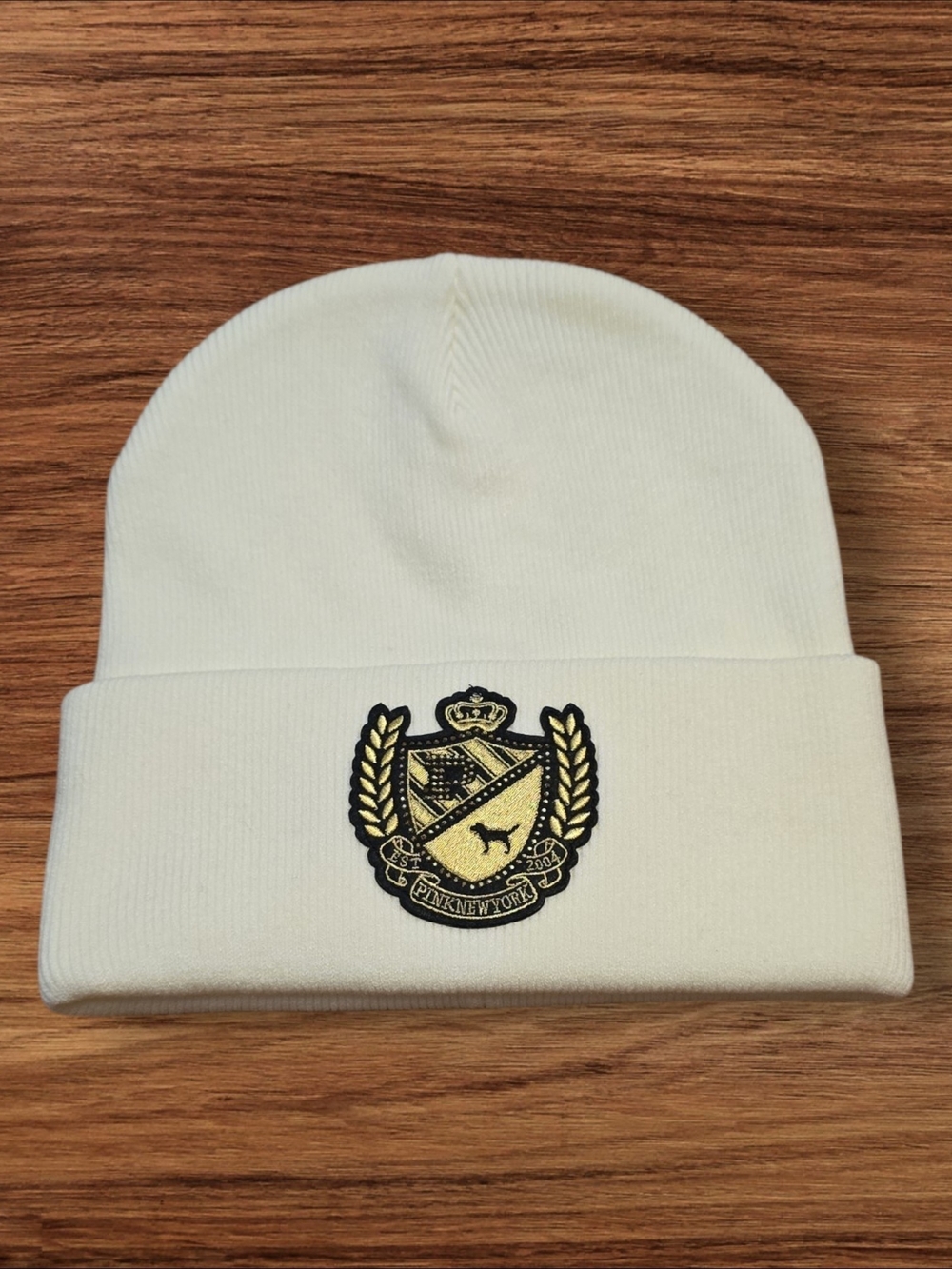 PINK Victoria's Secret Cream Beanie with Gold & Black Crest
